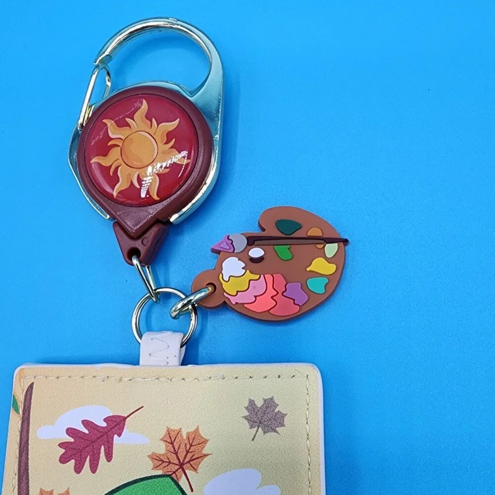 Loungefly Disney Tangled Pascal Autumn Paint Leaf Retractable Lanyard ID Holder